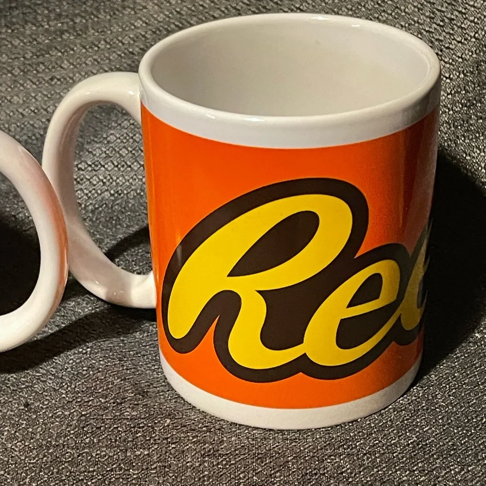Pair of Reese’s candy mugs.